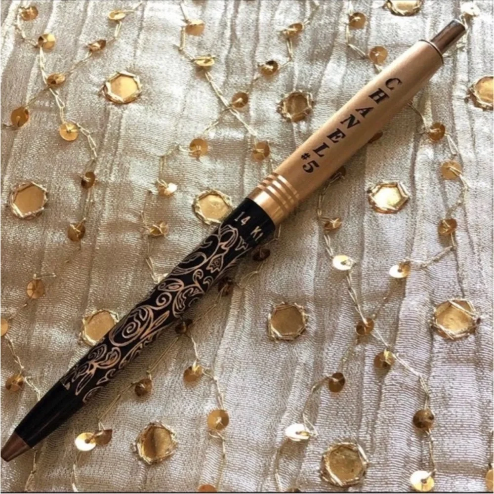 14K gold filigree pen.